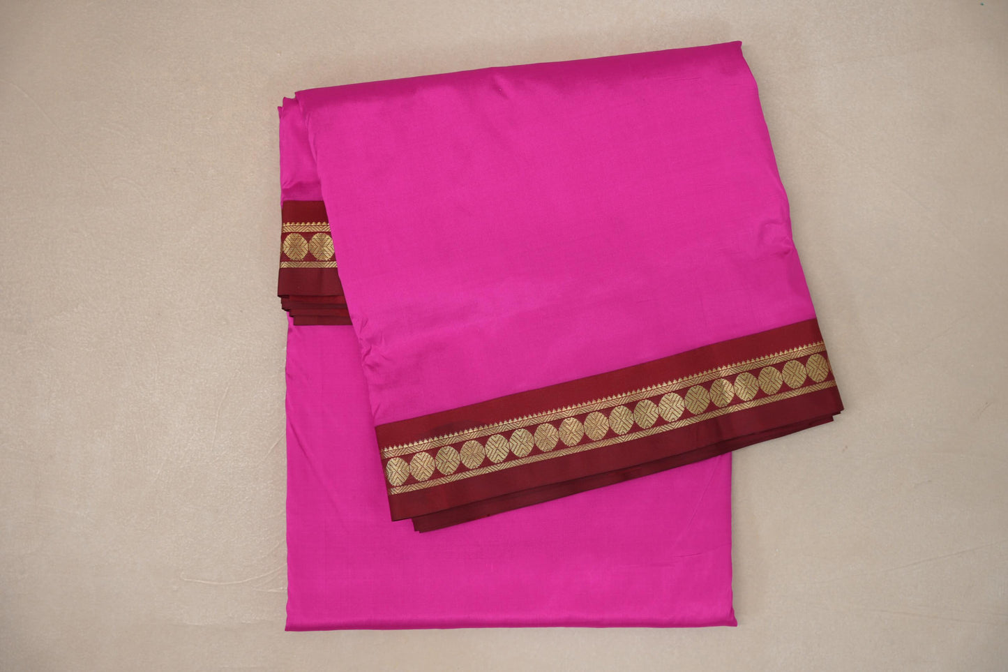 folded Rani Pink Ten Yards Silk Saree 