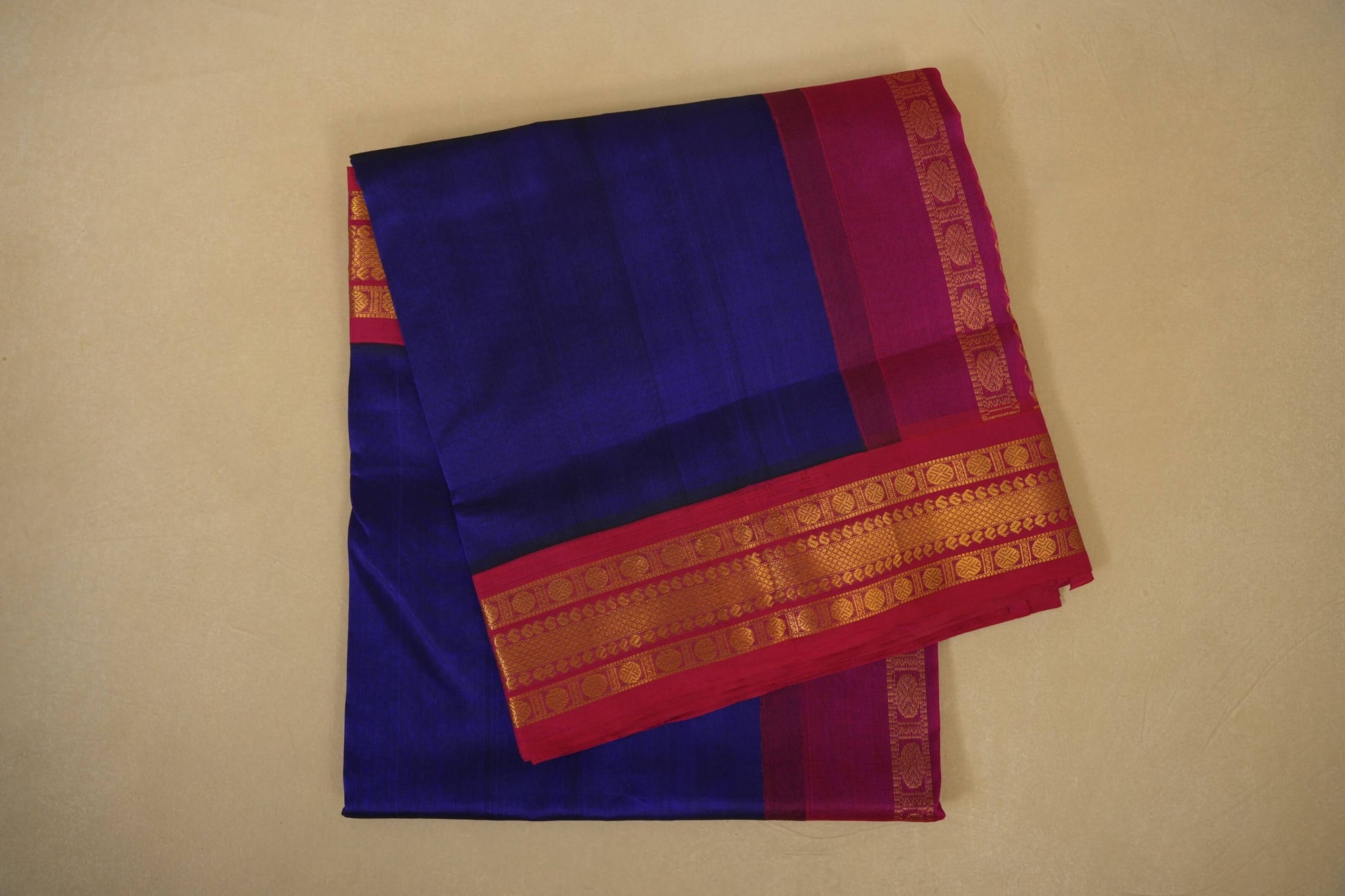 Folded Ink Blue with Rani Pink Borders Silk Cotton Saree