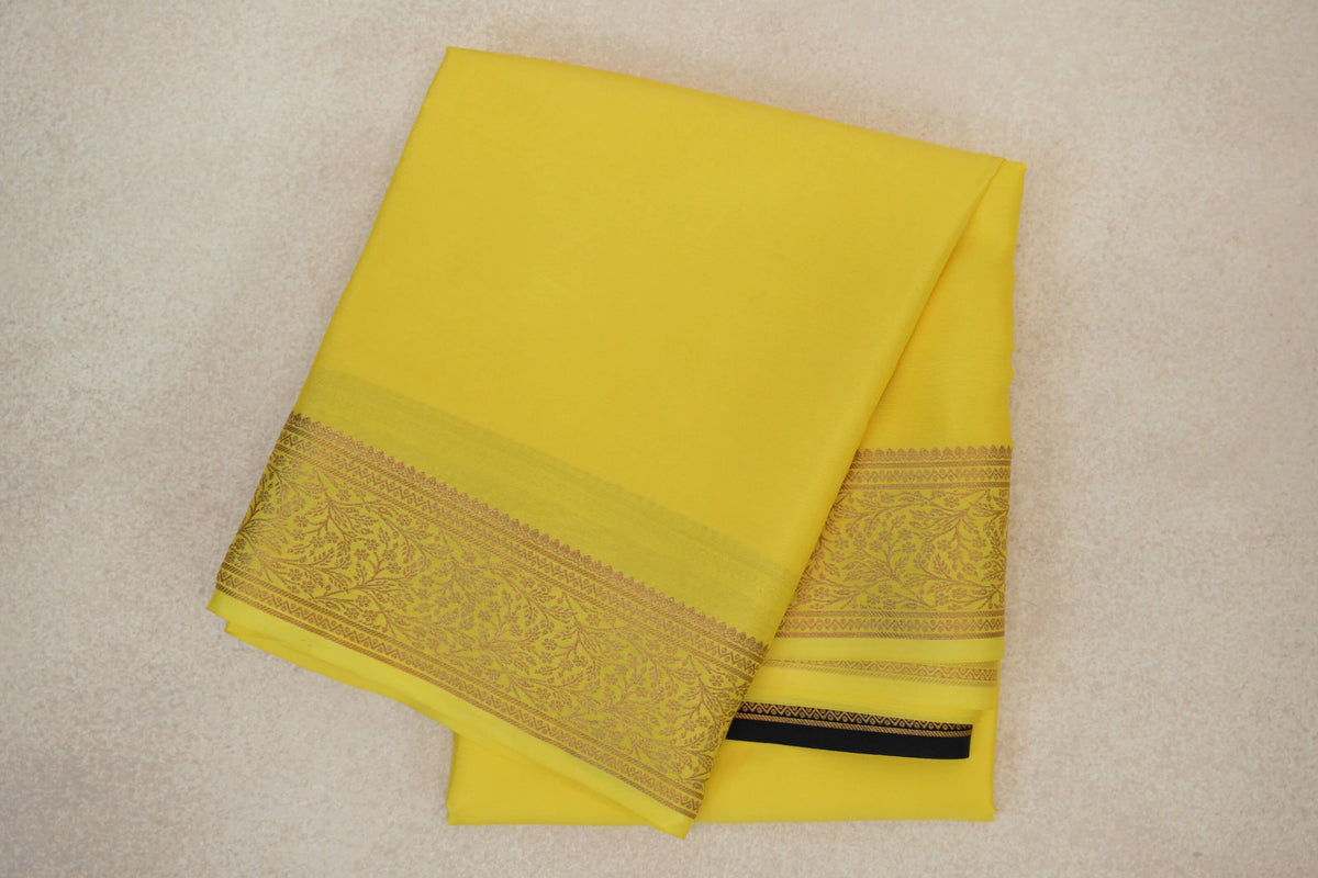 folded Bright Lemon Yellow Mysore Silk Saree