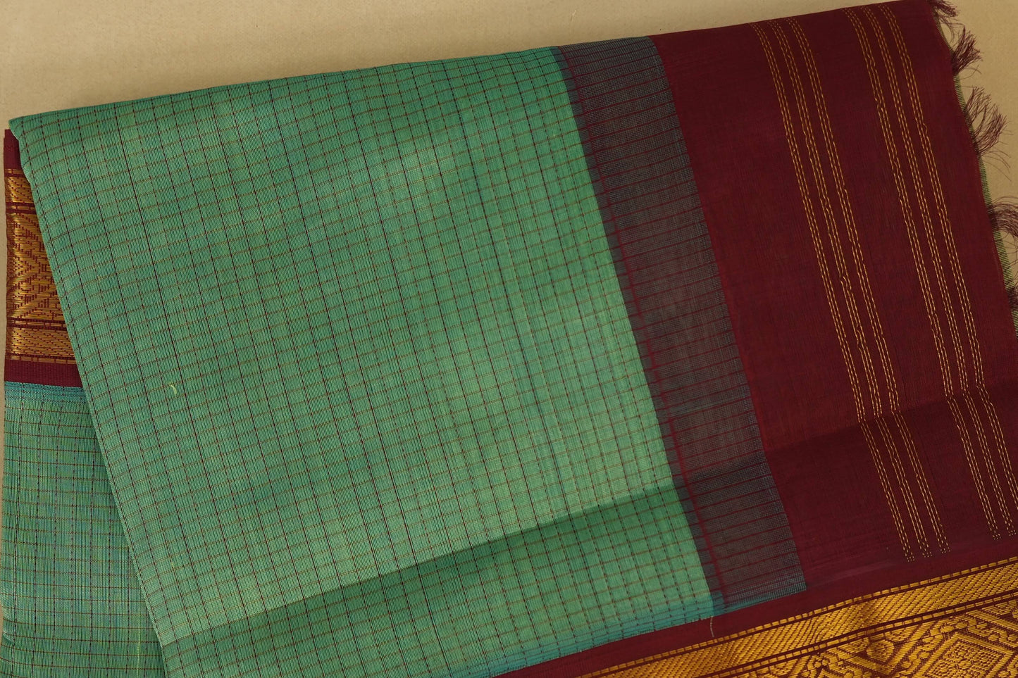 Rexona Green with maroon Borders Silk Cotton Saree body
