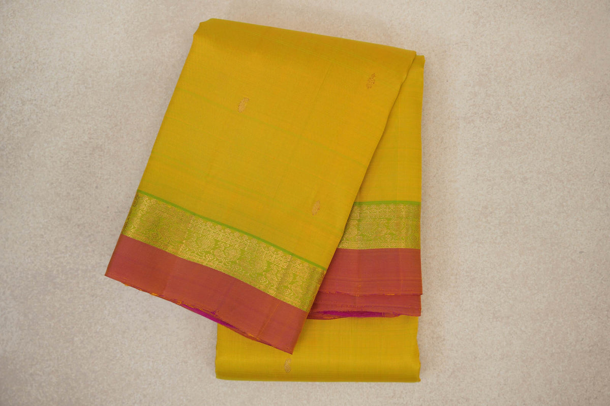 folded Lemon yellow vintage kanjivaram saree