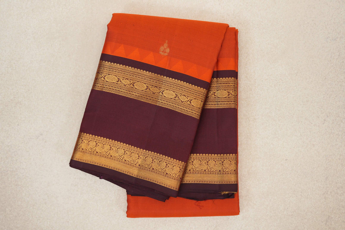 folded Deep Orange Light Weight Kanchipuram Silk Saree