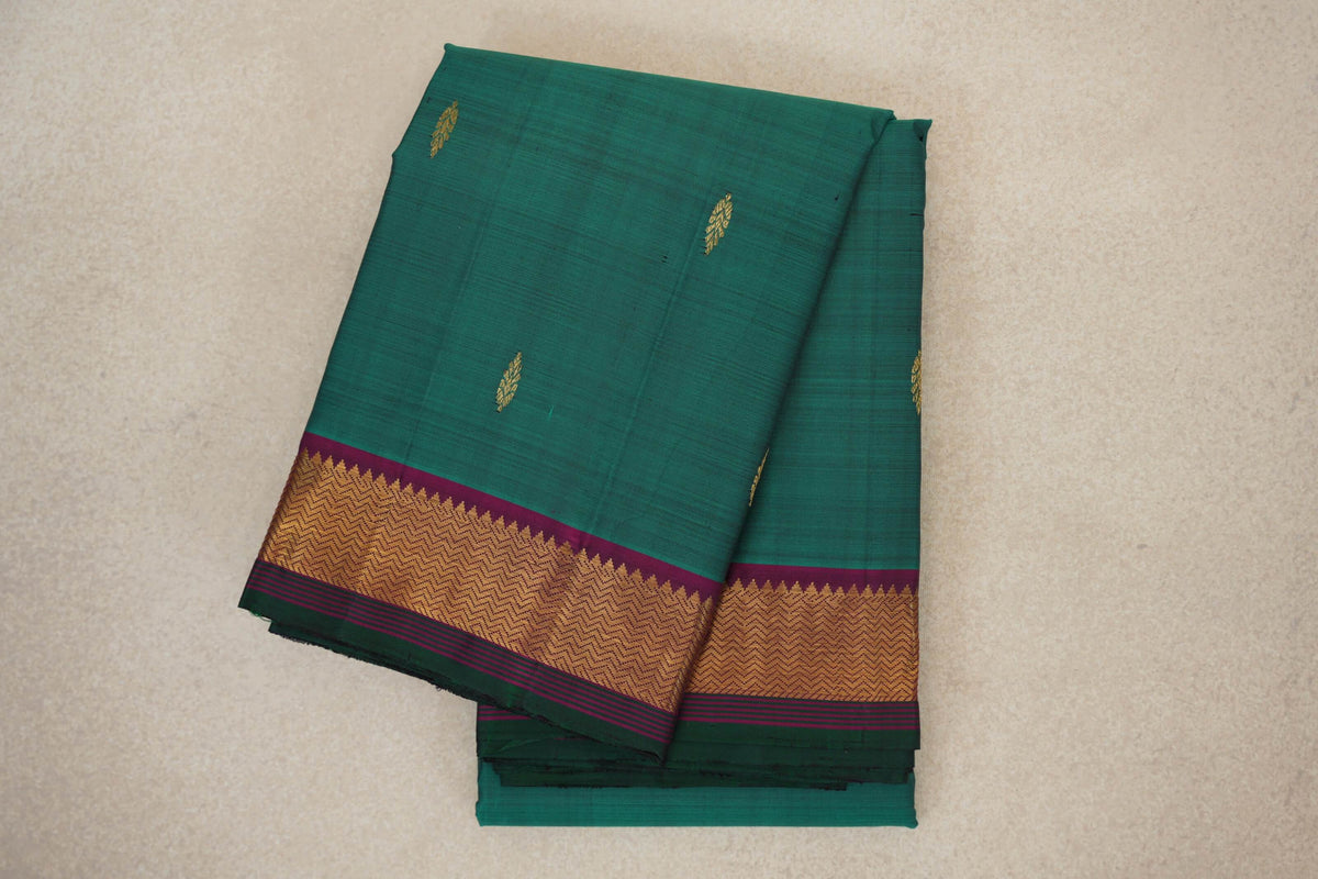 folded Teal Green Vintage Kanjivaram Silk Saree