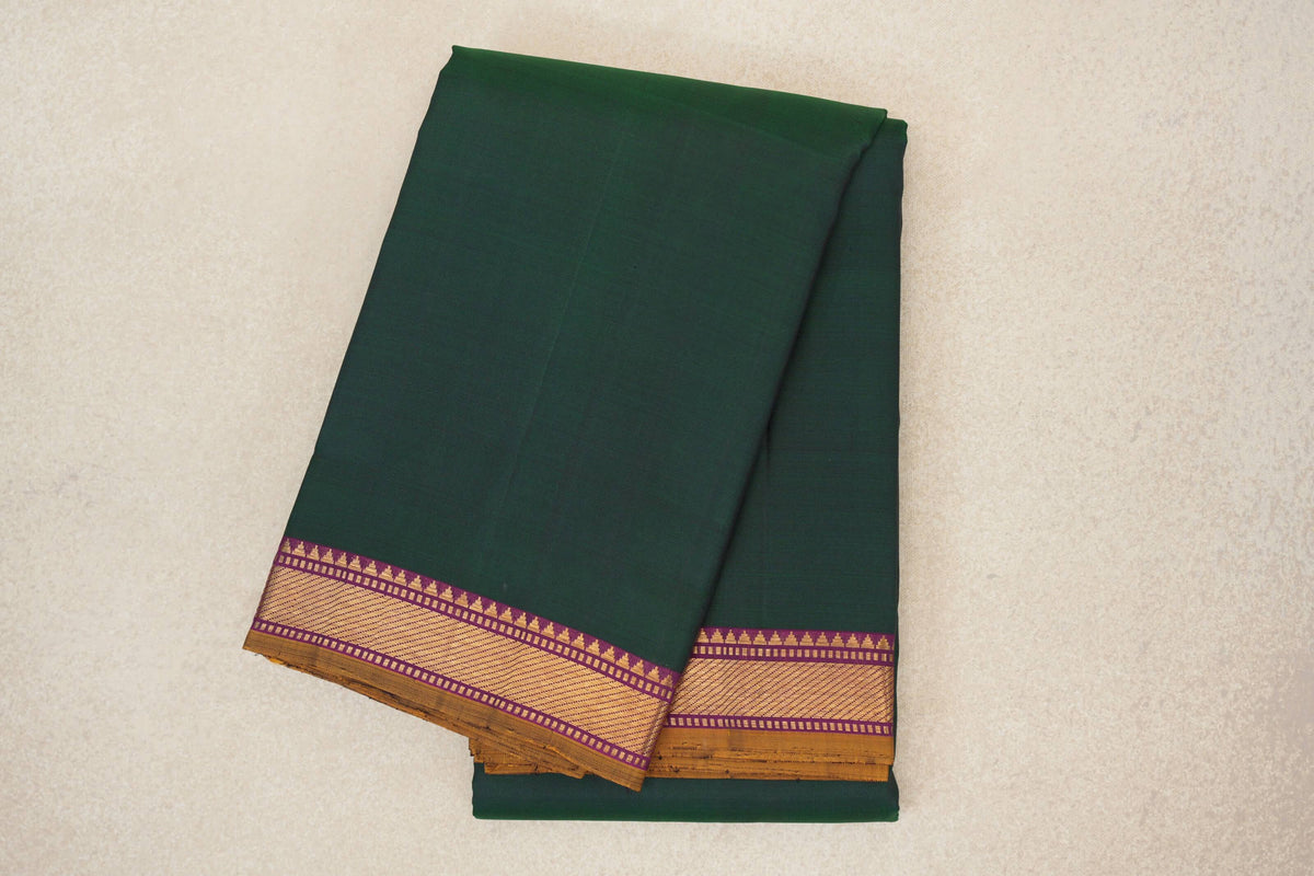 folded Deep Forest Green Vintage Kanjivaram Silk Saree
