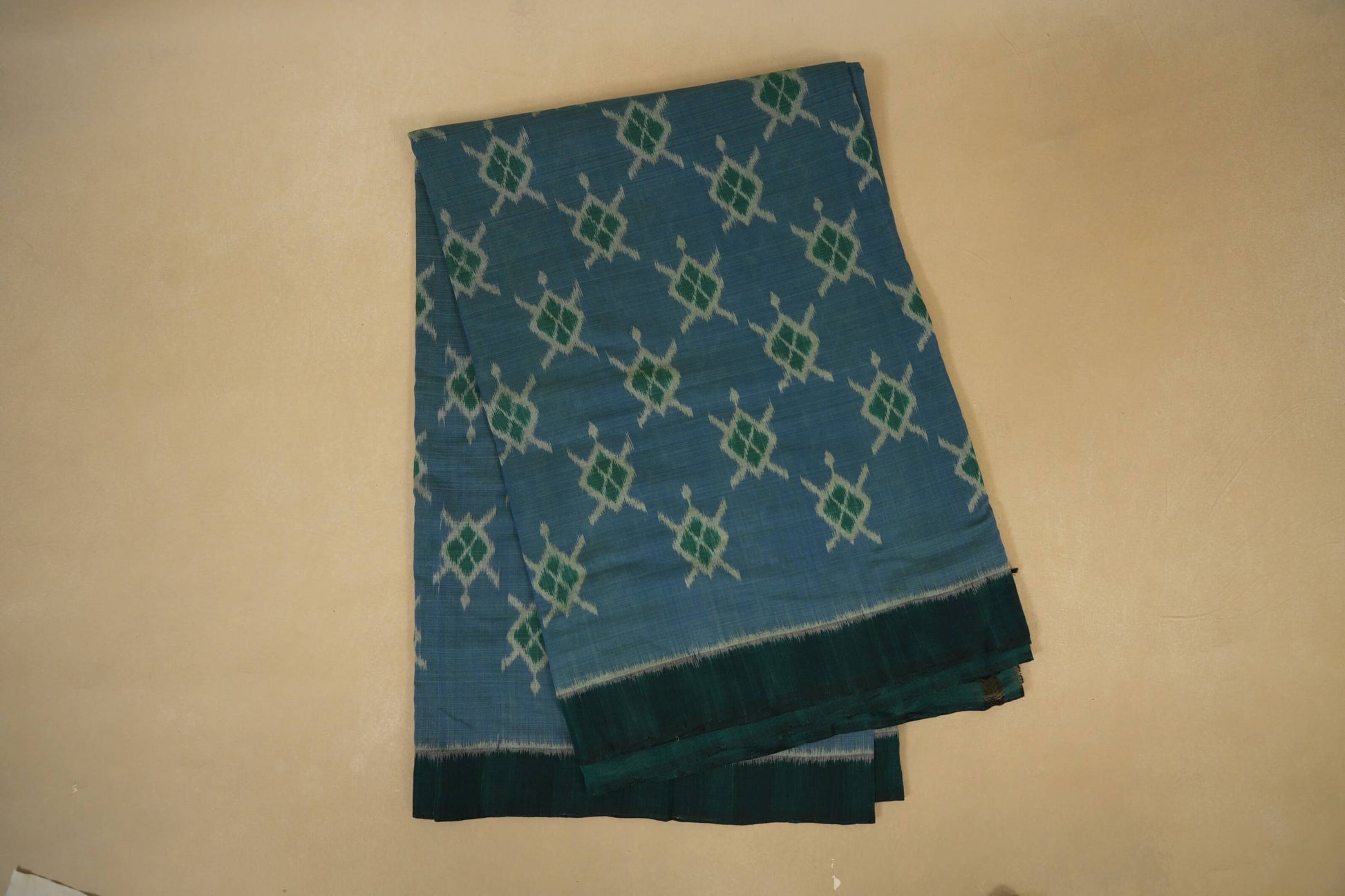 Folded Greenish Blue Dual Tone with Green Borders Ikat Cotton Saree