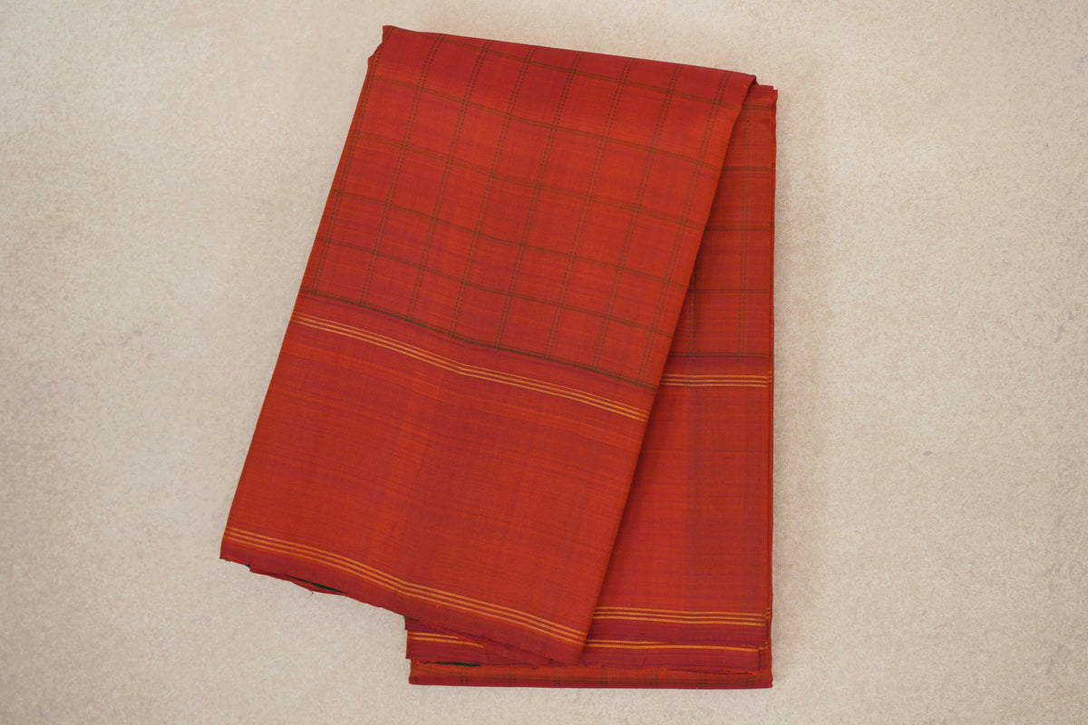 Folded Reddish Orange Vintage Kanjivaram Silk Saree