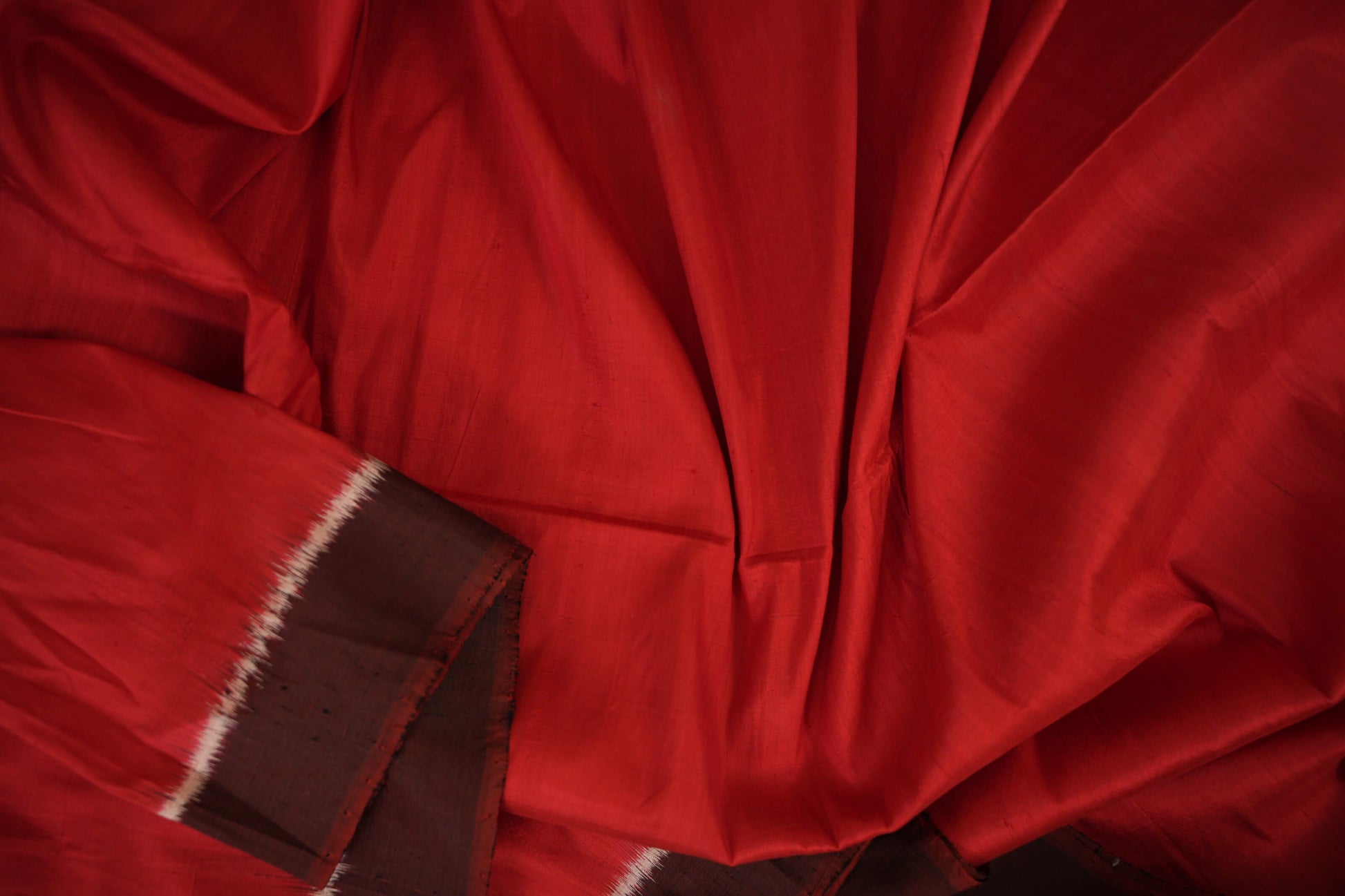 Reddish Orange Ikat Silk Saree Zoom