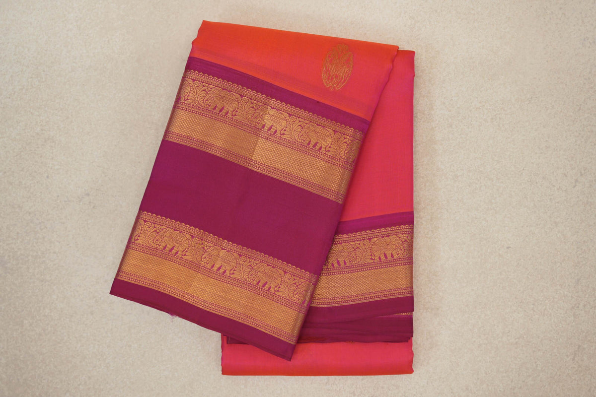 folded Orangish Pink Light Weight Kanchipuram Silk Saree