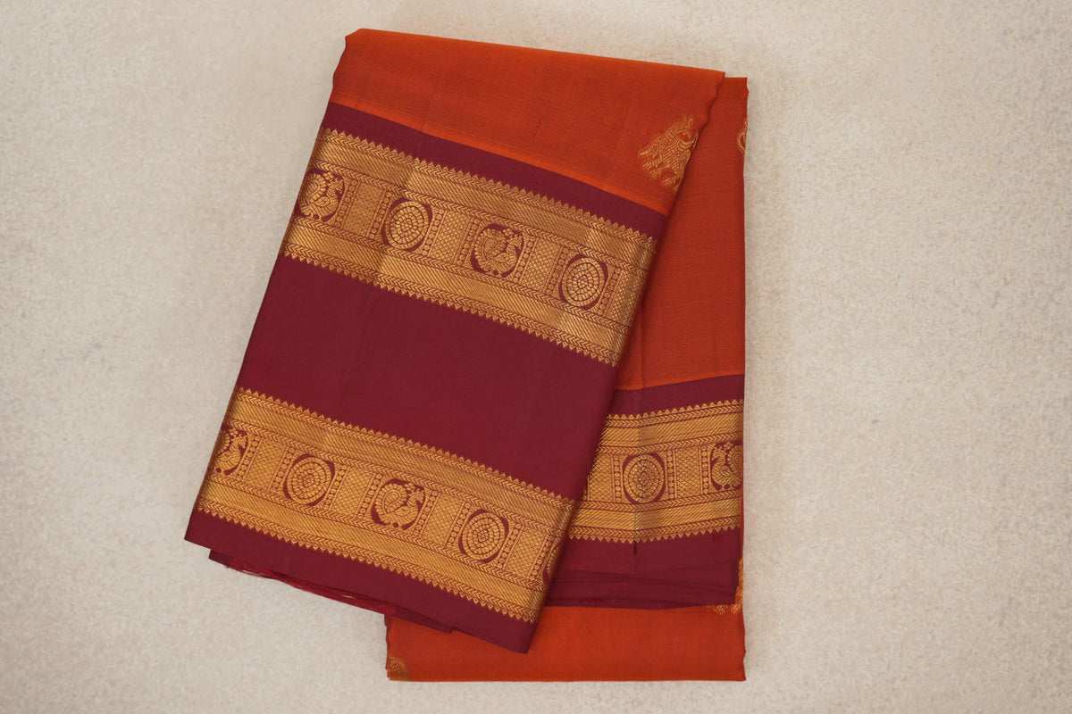 folded Rust Orange Light Weight Kanchipuram Silk Saree