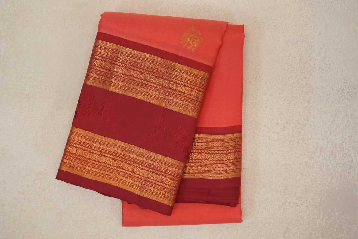 Folded Coral Pink Light Weight Kanchipuram Silk Saree 