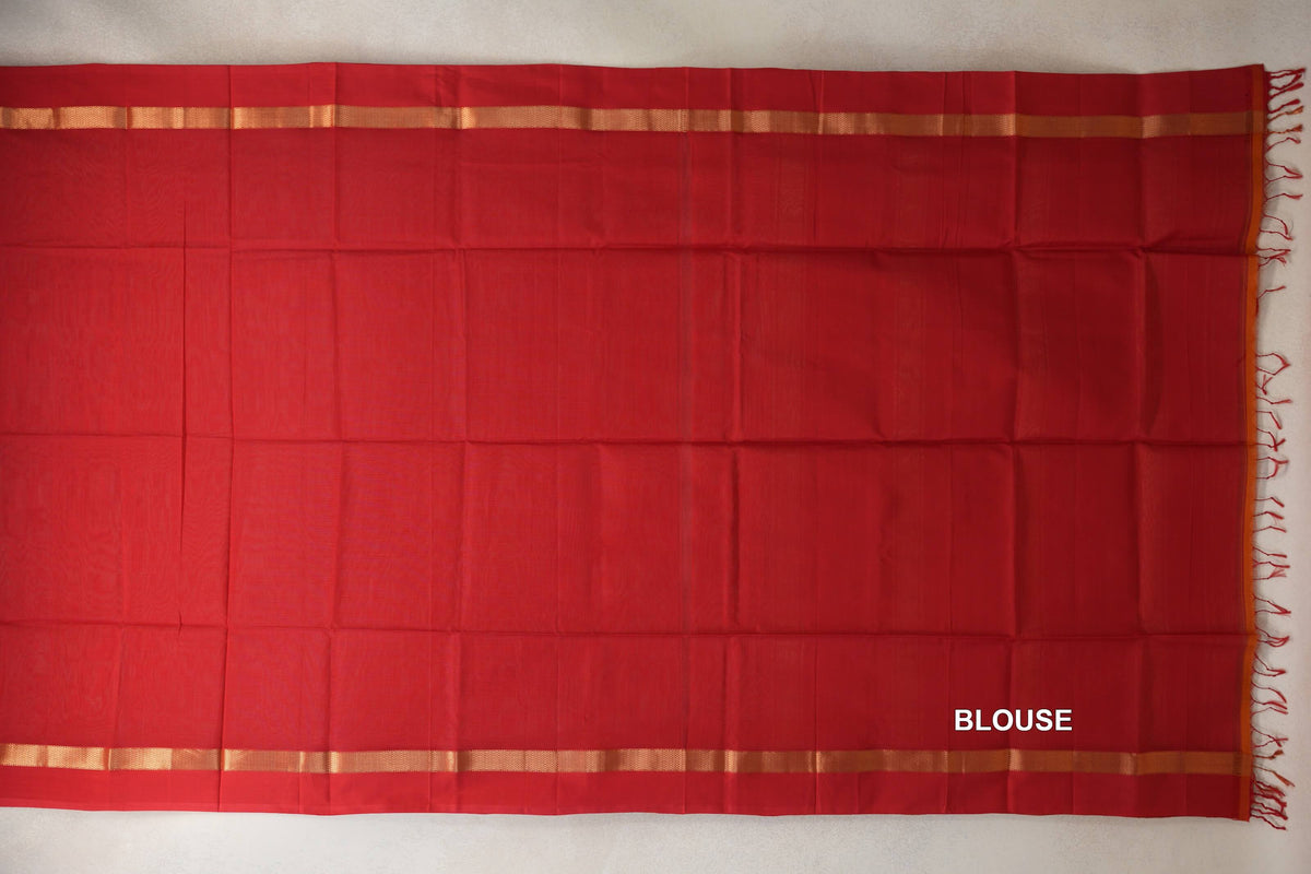 Vermilion Red Maheshwari silk cotton blouse piece laid flat, with gold-toned bands along the top and bottom and red tassels at one end.