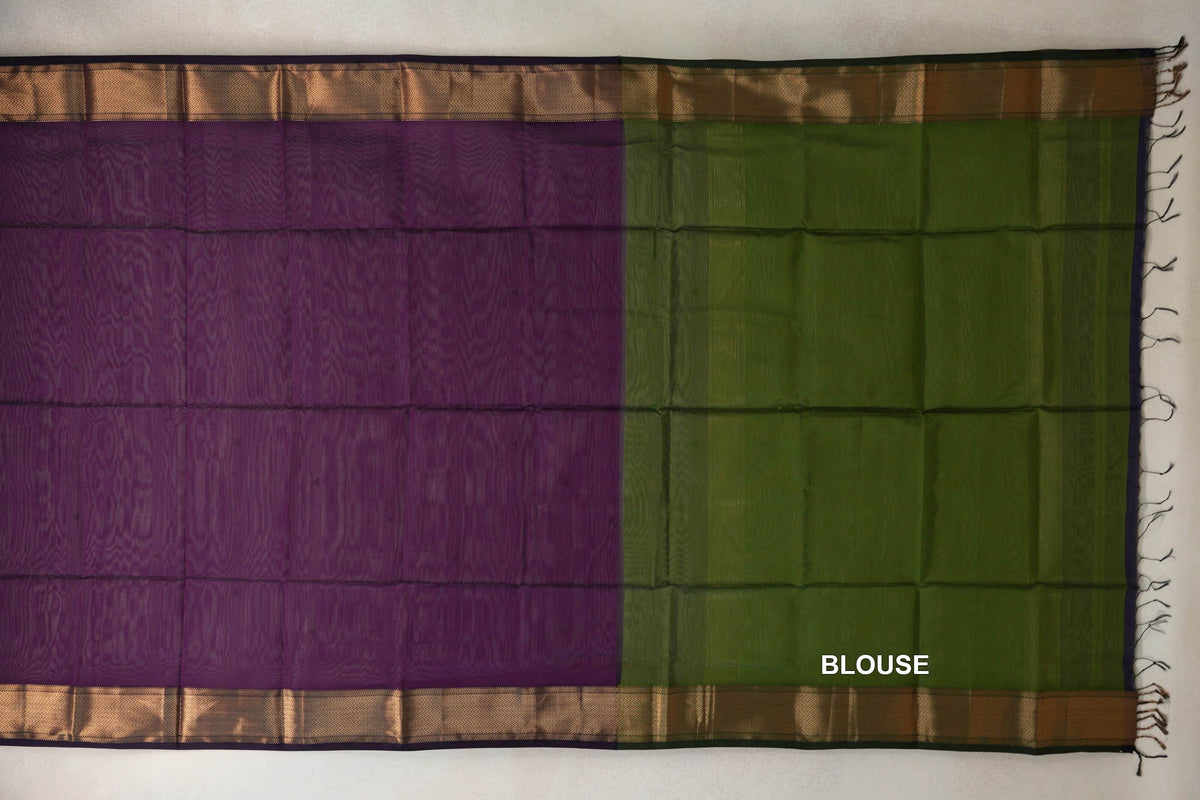 Deep purple Maheshwari silk cotton saree body laid beside an olive green blouse piece, with patterned gold-toned borders and fringe.