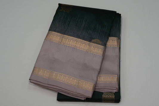 Bottle green light weight kanchipuram silk saree
