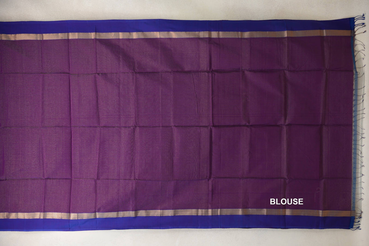Deep purple Maheshwari silk cotton blouse piece laid flat, with violet purple borders, narrow gold-toned bands and fringe at one end.