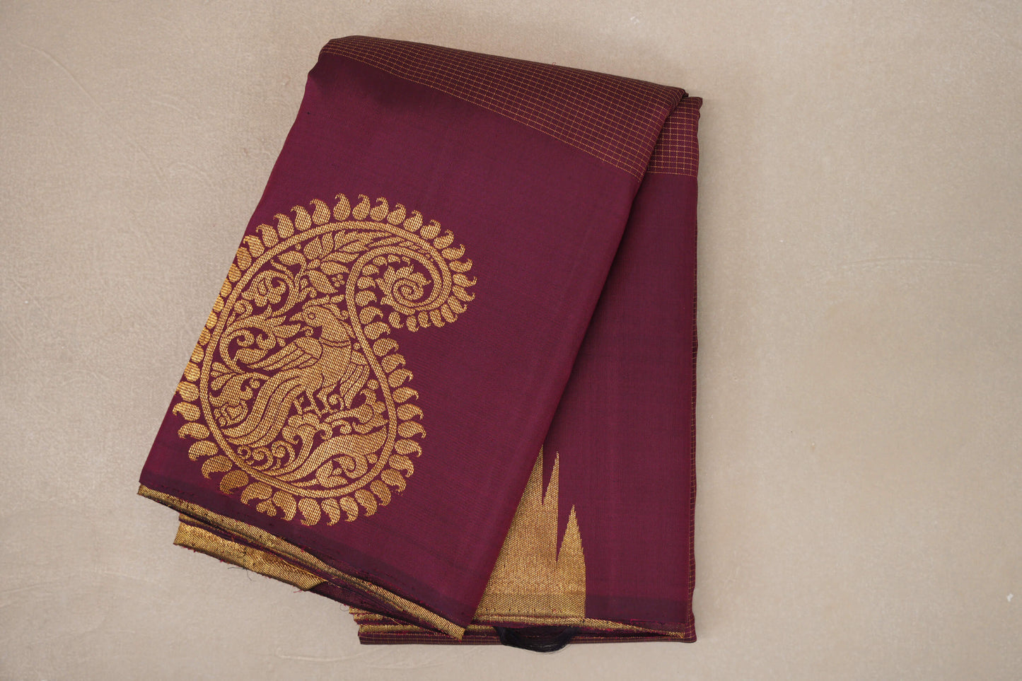 folded Deep Maroon Temple Borders Vintage Kanjivaram Silk Saree 