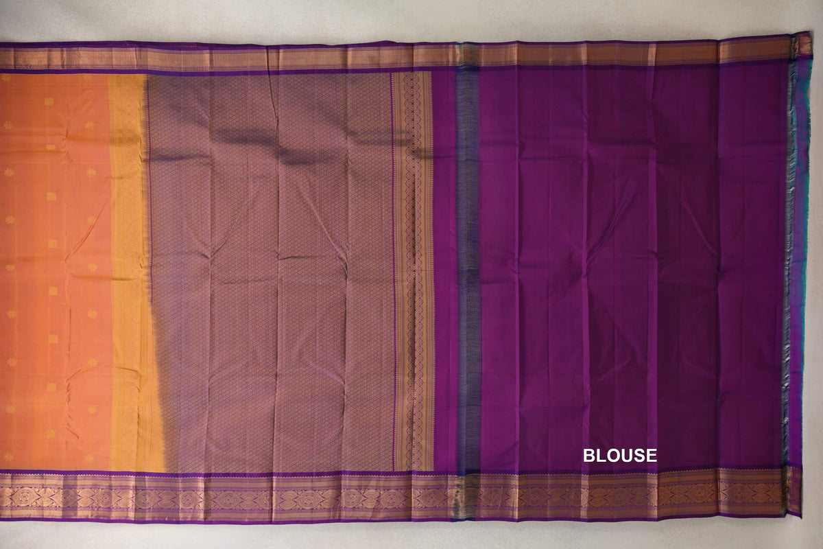 Light Weight Kanchipuram silk saree spread out, showing a pink and yellow body, a patterned purple section, ornate borders and deep purple blouse fabric.
