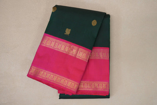 Deep Bottle Green with Orangish Pink Rettai Pettu Borders Vintage Kanjivaram Silk Saree by Shreenivas Silks PSSR019570