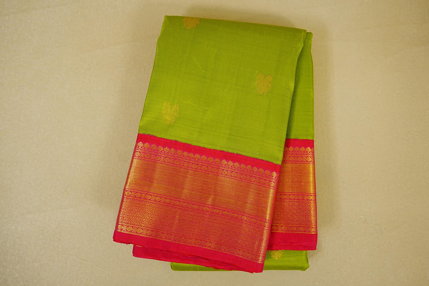 folded Parrot Green with Reddish Pink Borders Vintage Kanjivaram Silk Saree