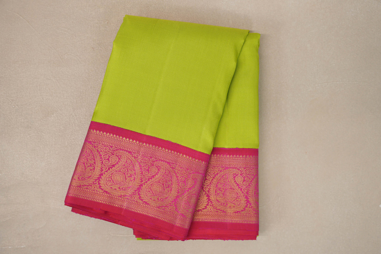folded Parrot Green with Orangish Pink Borders Vintage Kanjivaram Silk Saree