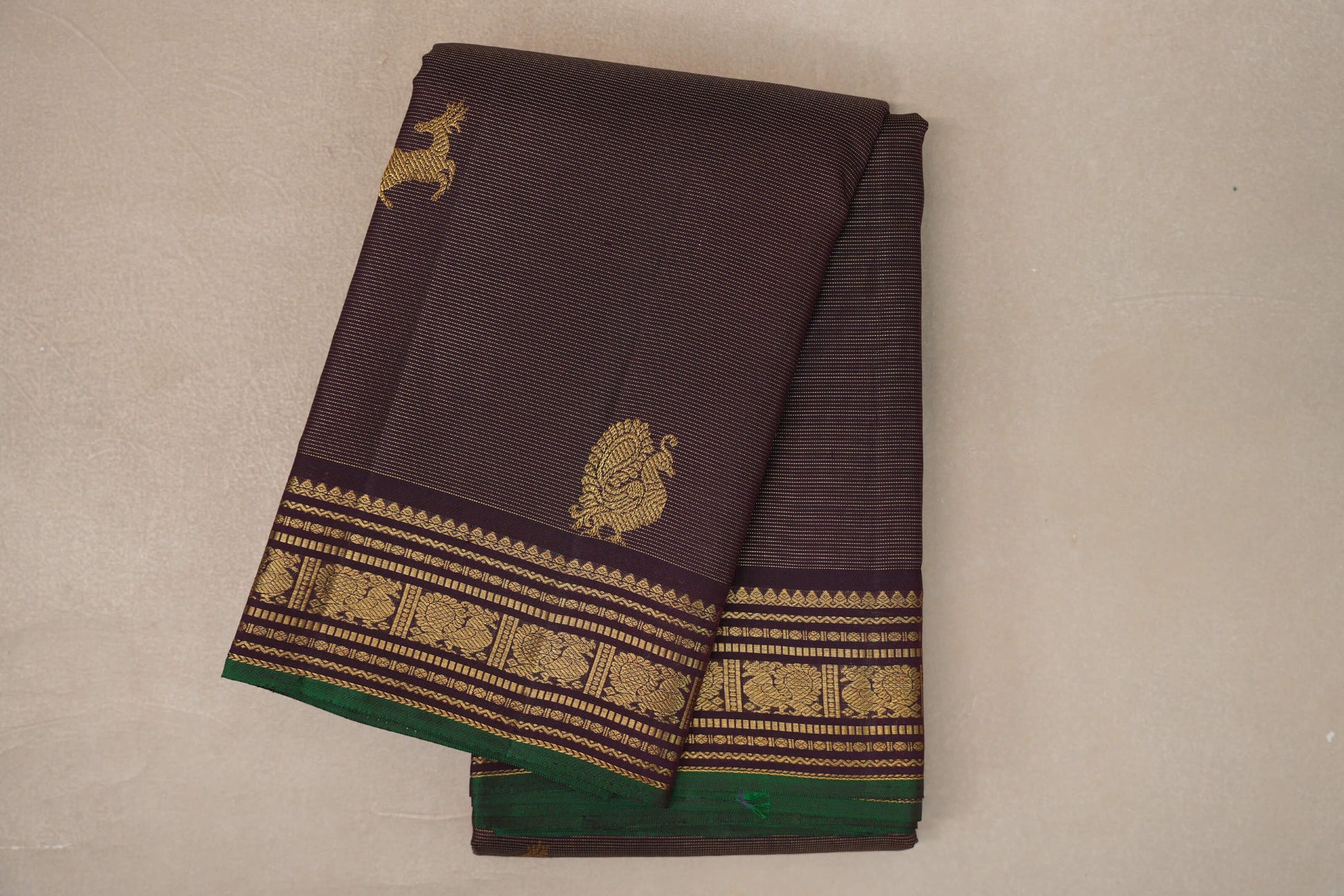 folded Deep plum Kanjivaram Silk Saree