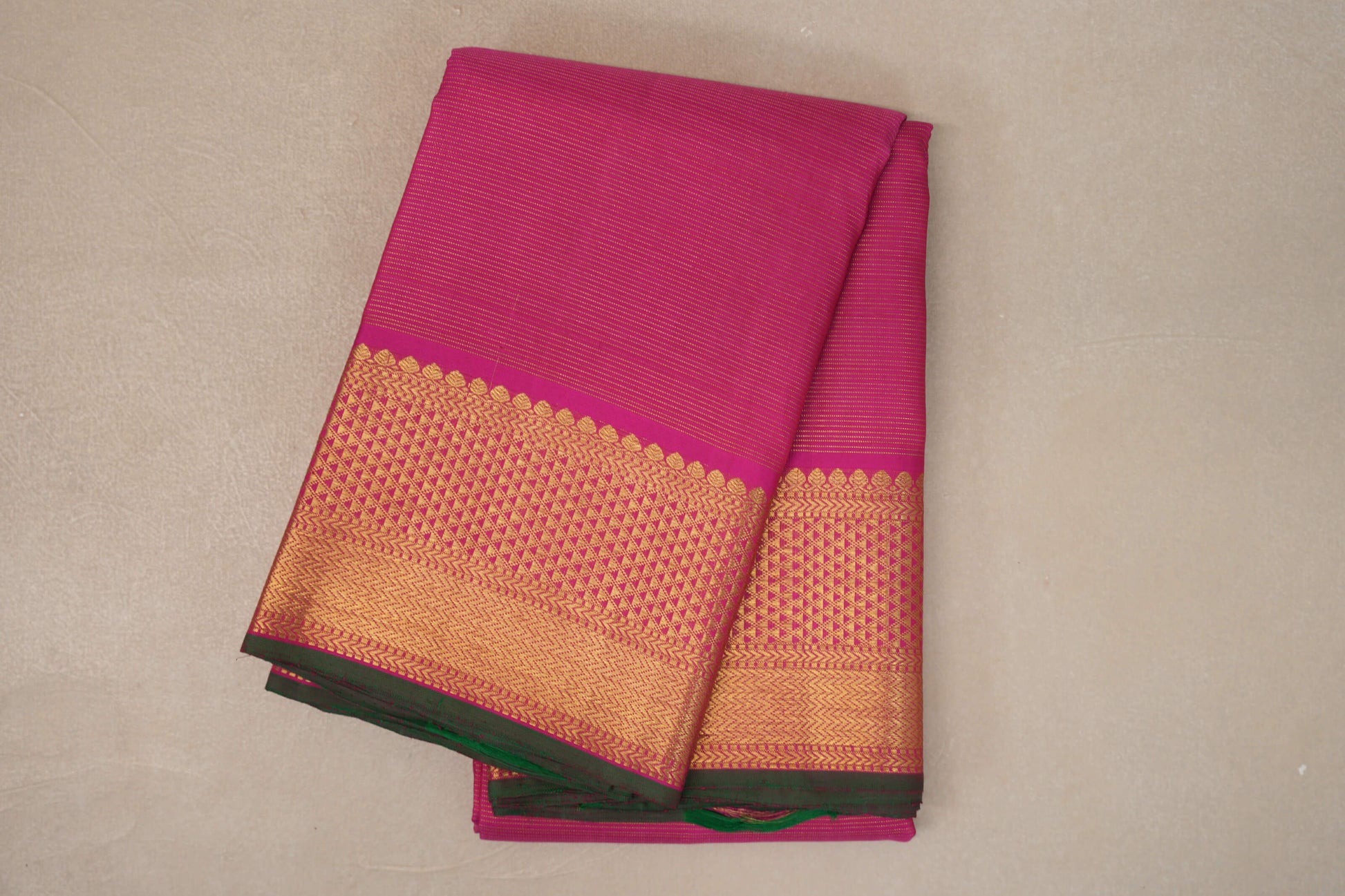 folded Bright Pink Kanjivaram Silk Saree
