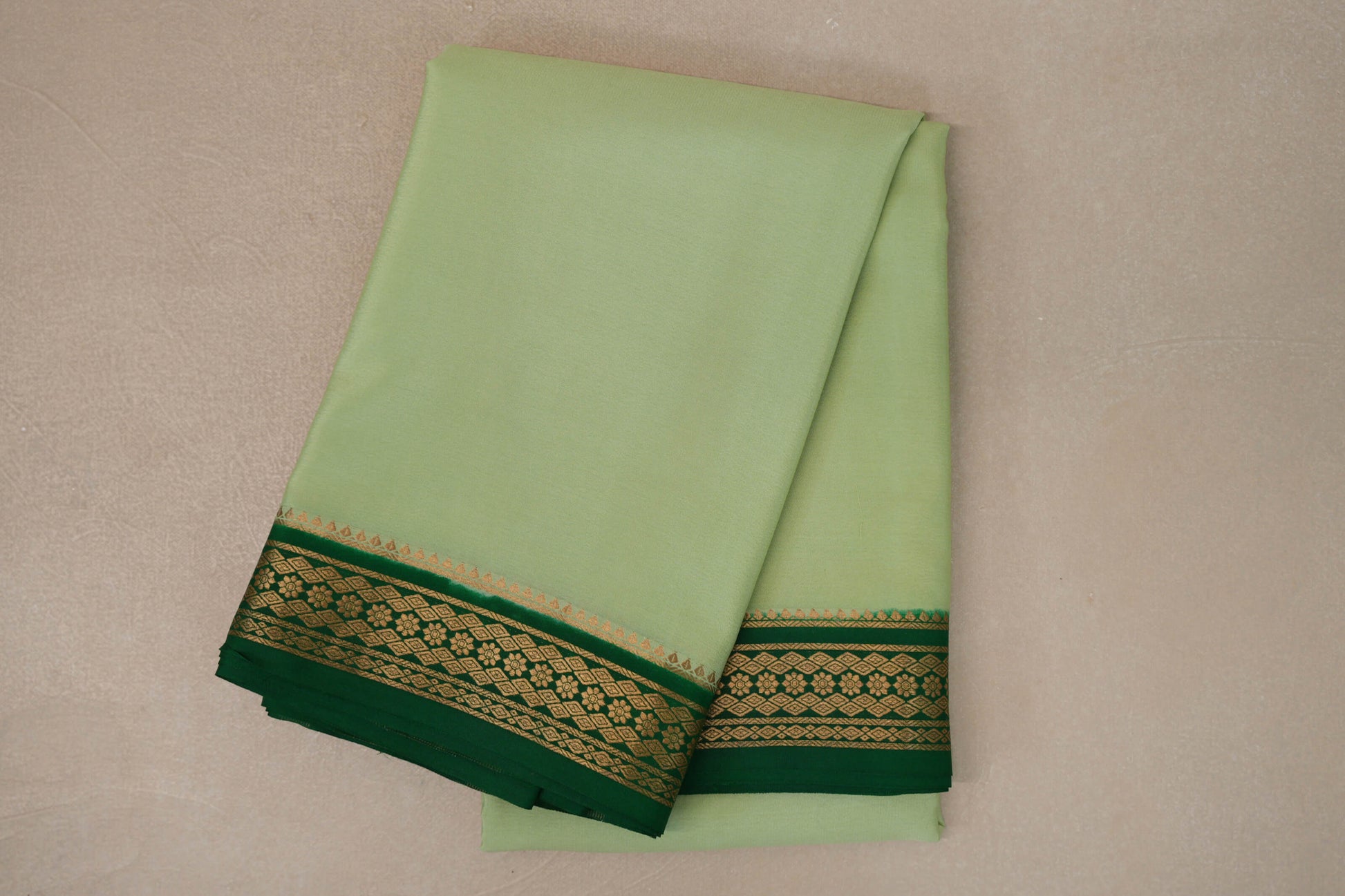 folded Pastel Pistachio Green  Mysore Silk Saree