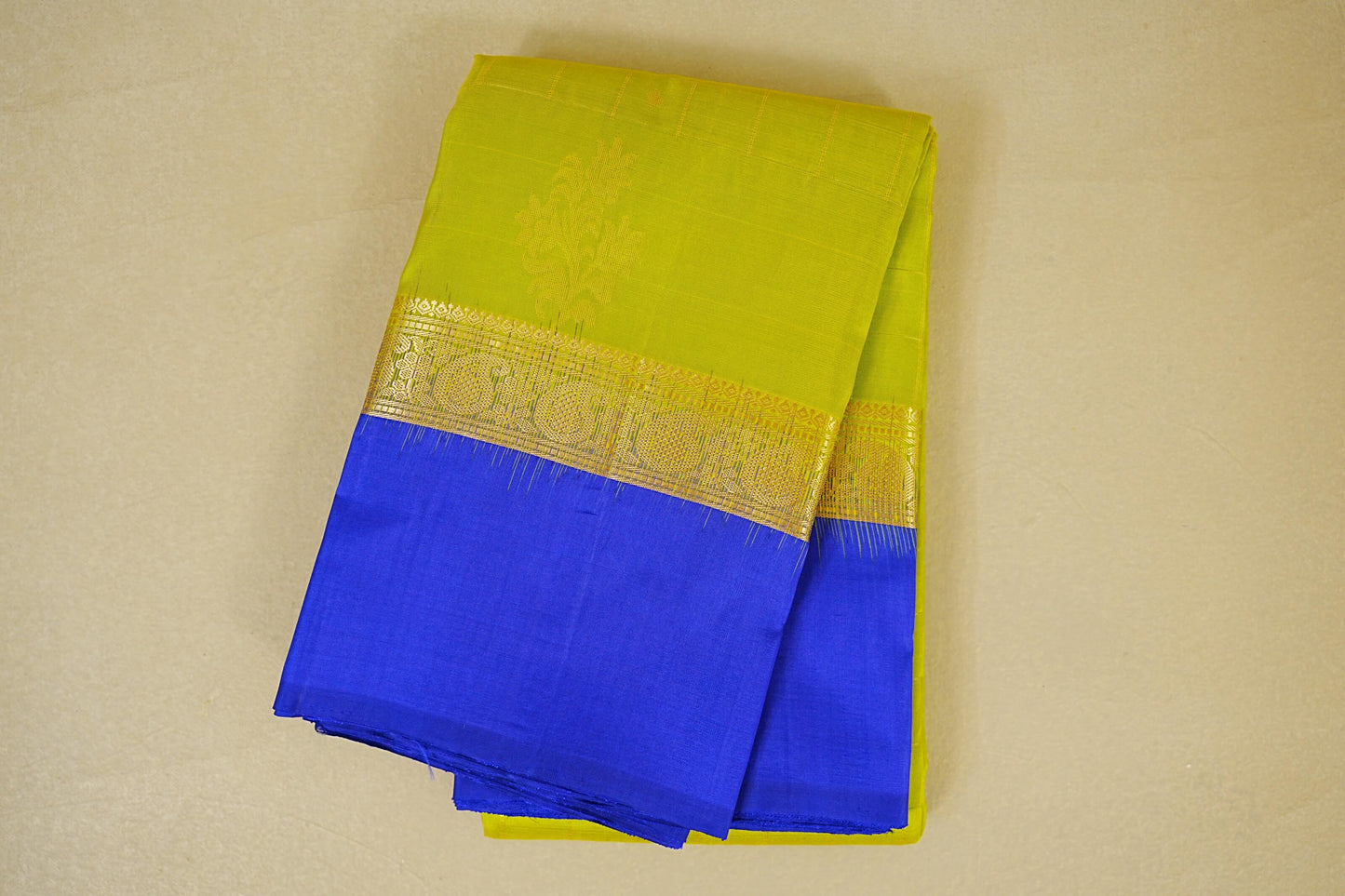 folded Dual Tone of Green and yellow Light Weight Kanchipuram Silk Saree