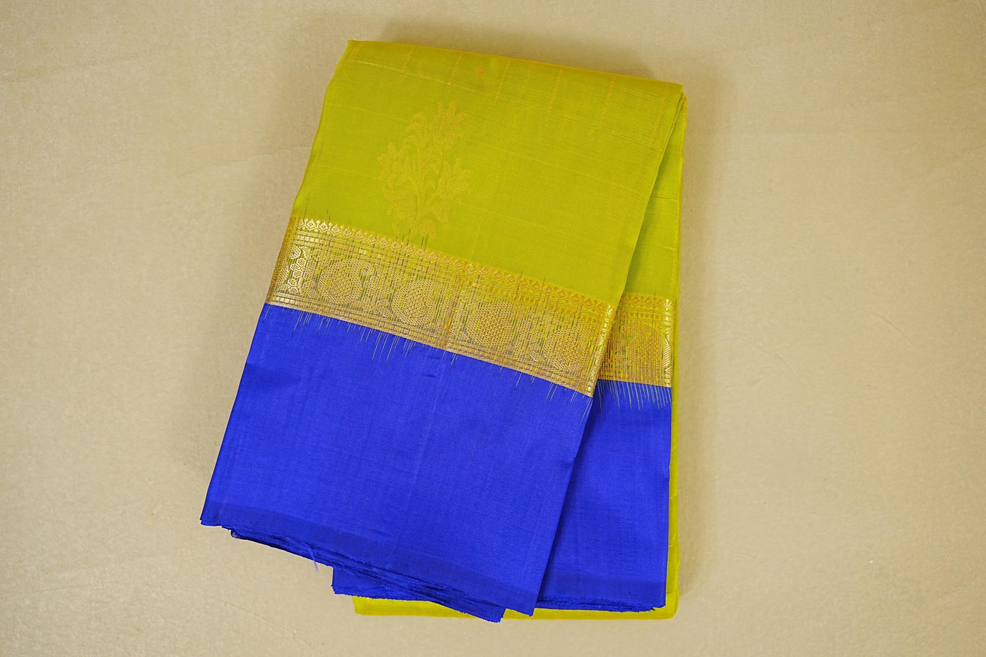 folded Dual Tone of Green and yellow Light Weight Kanchipuram Silk Saree