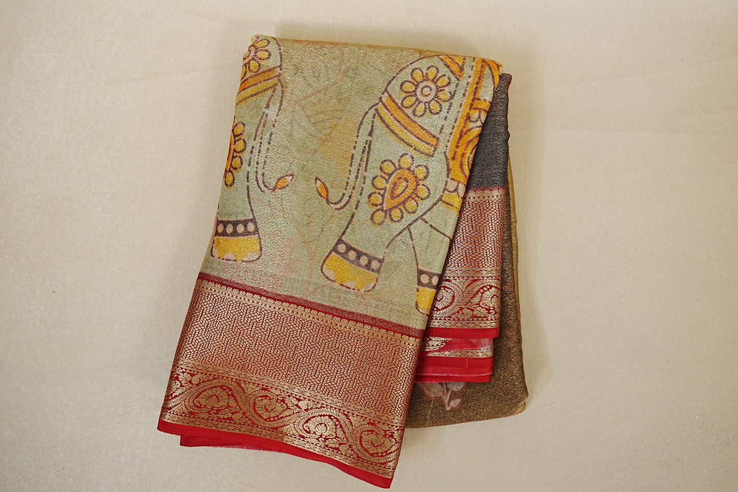 folded Dual Tone Pastel Green with Antique Gold and Deep Red Borders Mysore Silk Saree
