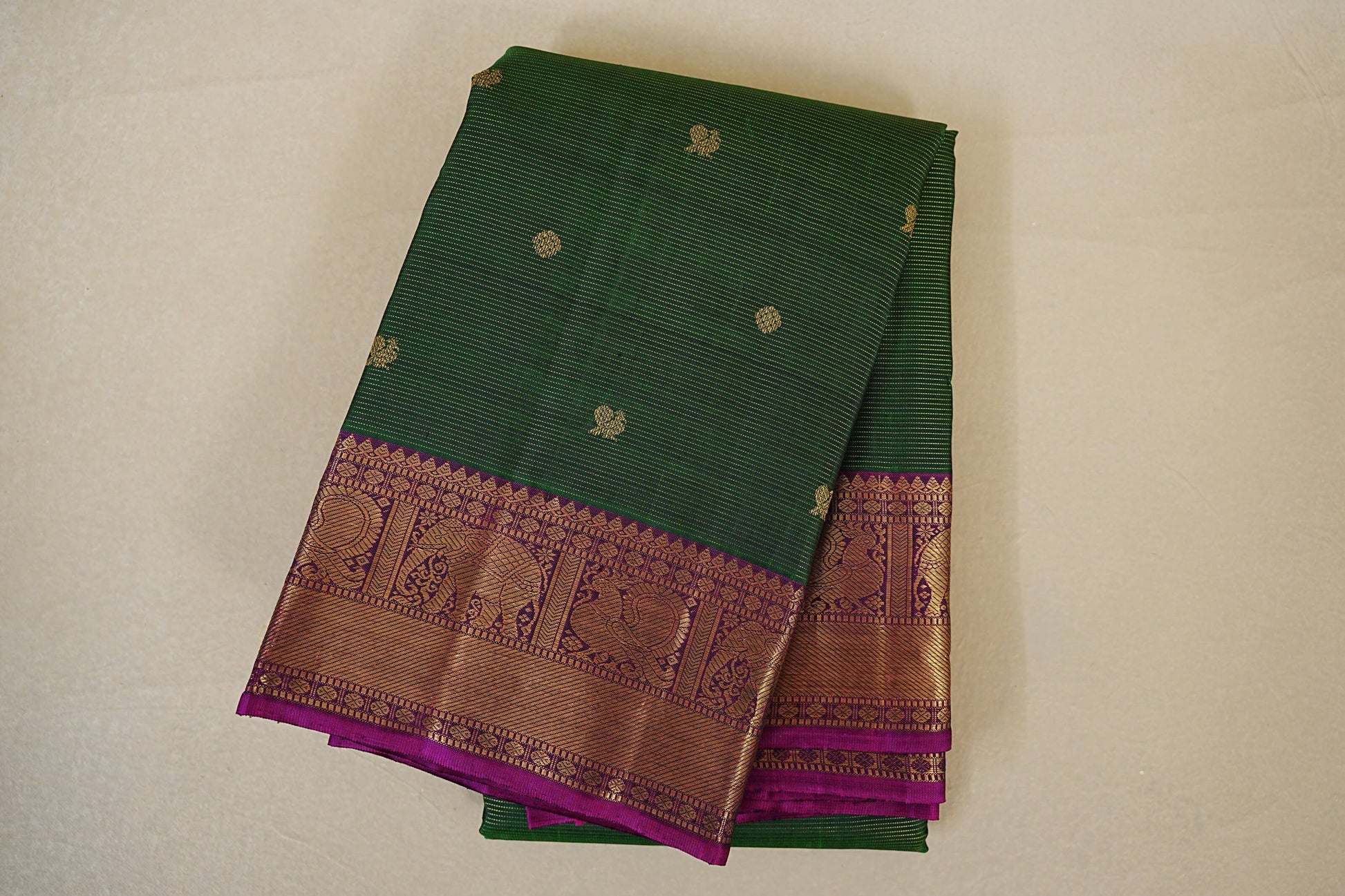 folded Bottle Green with Magenta Borders Heirloom Kanjivaram Silk Saree 