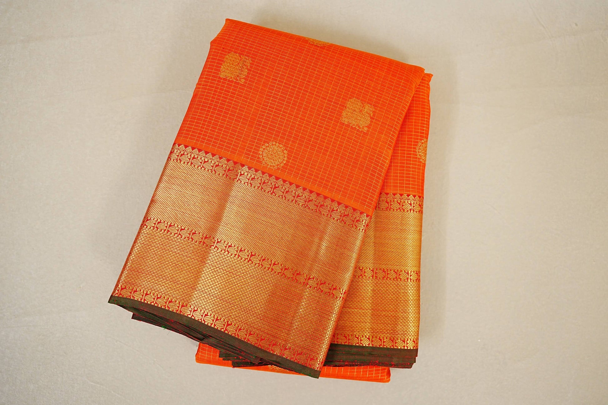 folded Reddish Orange Heirloom Kanjivaram Silk Saree 