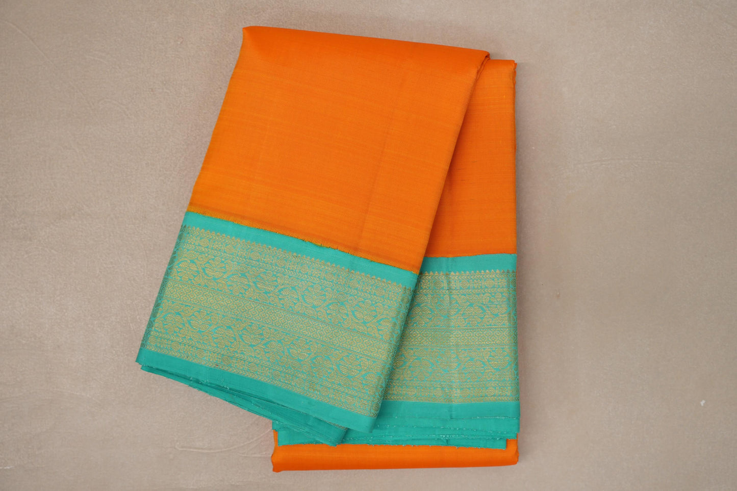 folded Mango Orange Vintage Kanjivaram Silk Saree