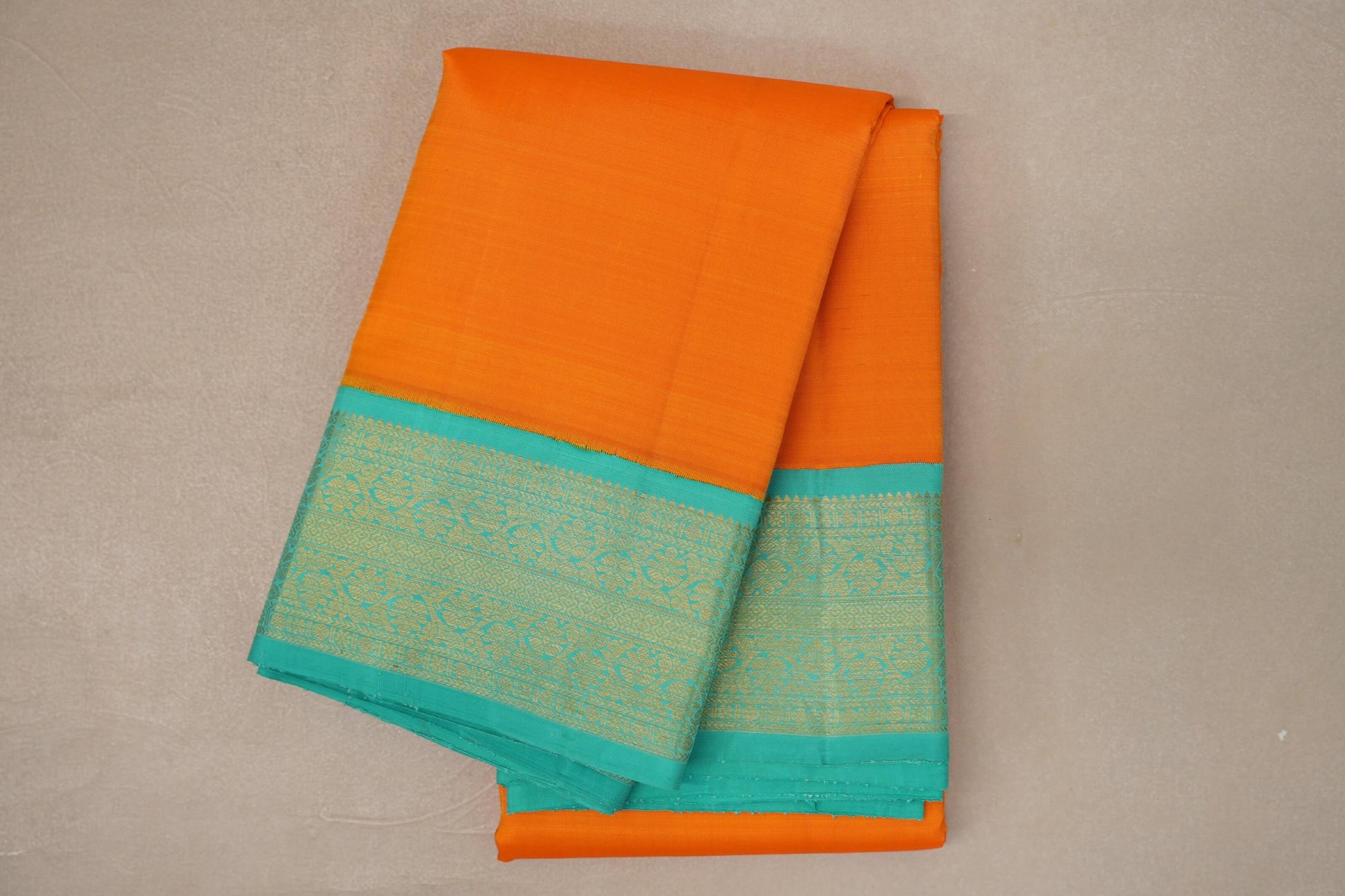 folded Mango Orange Vintage Kanjivaram Silk Saree