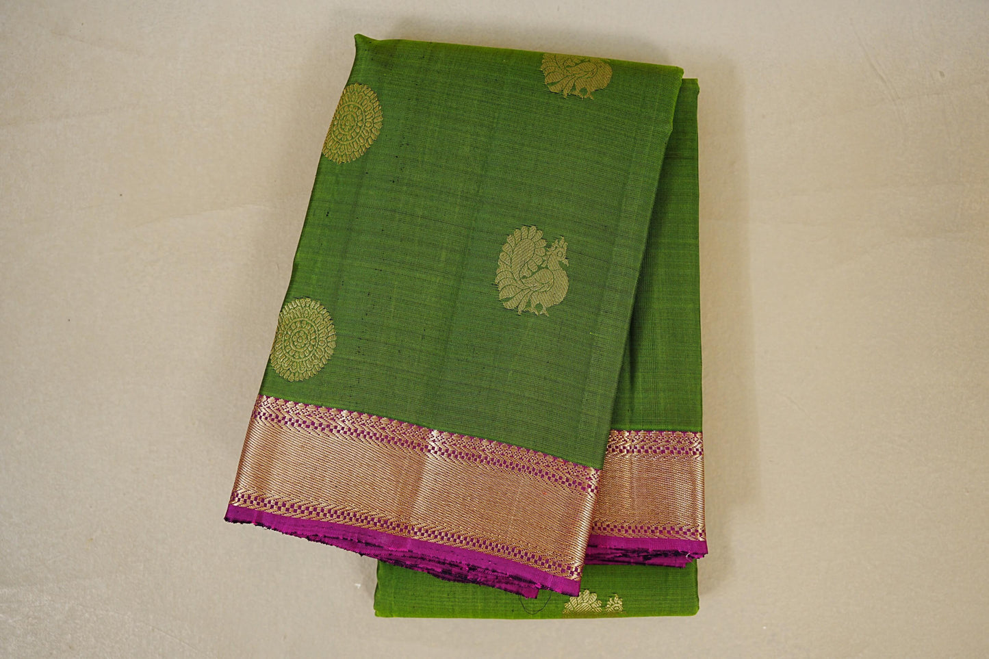 folded Medium Green with Purple Borders Vintage Kanjivaram Silk Saree