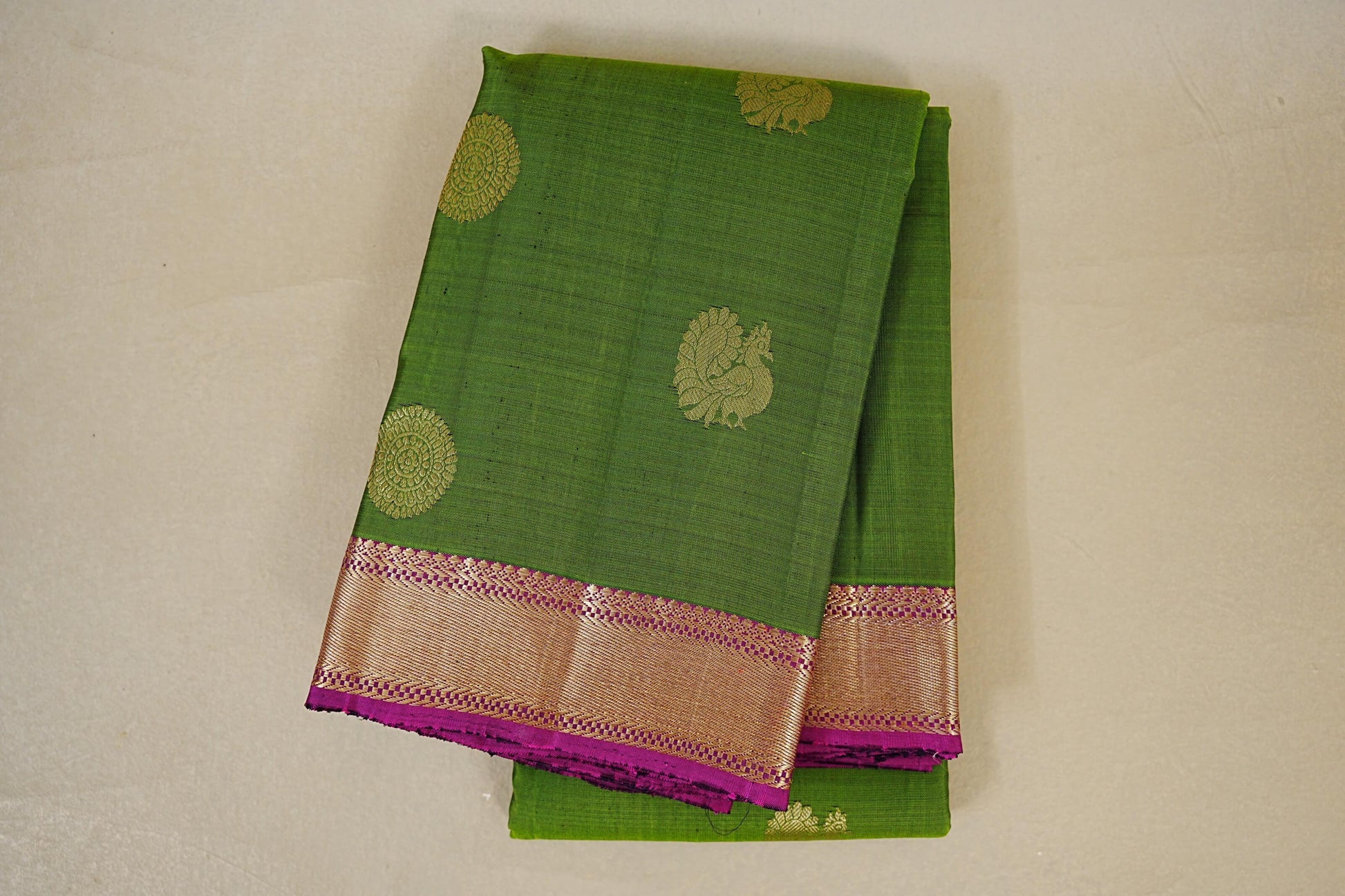 folded Medium Green with Purple Borders Vintage Kanjivaram Silk Saree