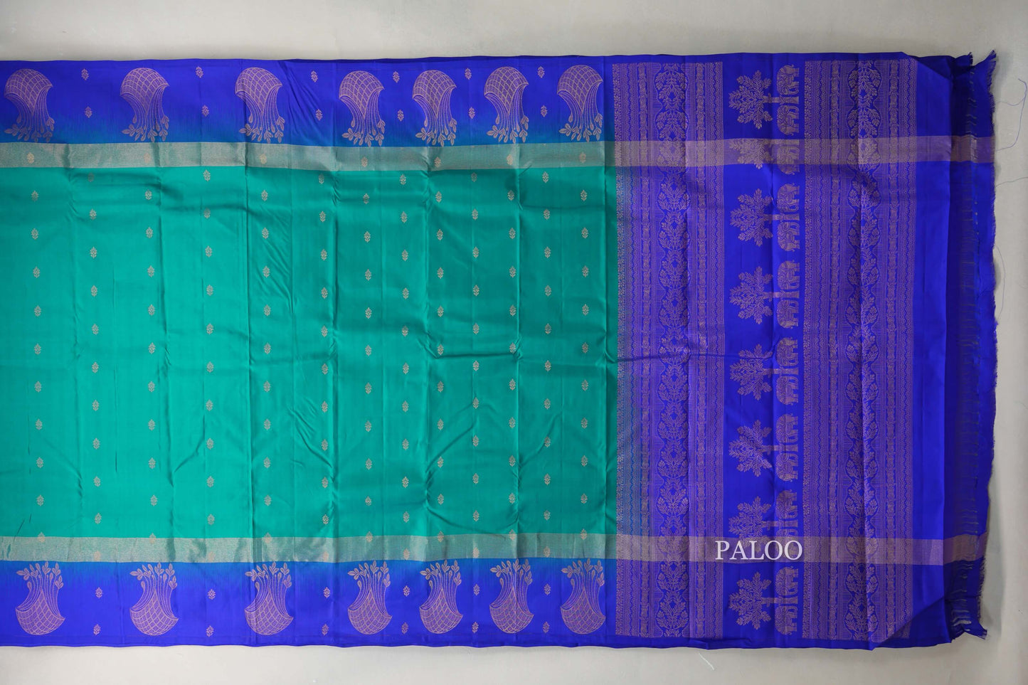 Peacock green with Deep Blue borders Light Weight Kanchipuram Silk Saree paloo