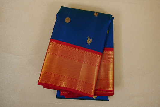 folded Peacock Blue with Bright Red Borders Vintage Kanjivaram Silk Saree 