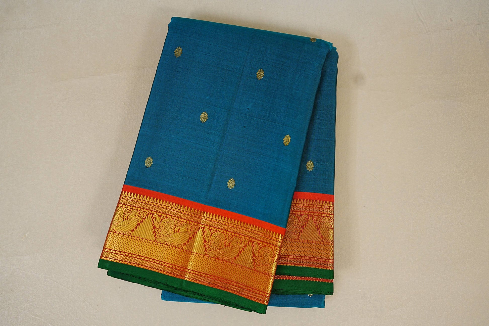folded Bluish Green with Rust Orange Borders and Green Selvedge Vintage Kanjivaram Silk Saree