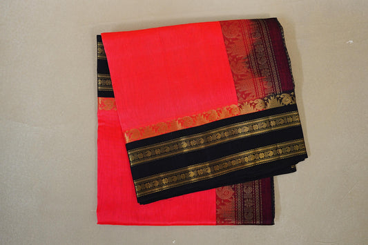 folded Bright Orangish Pink with Black Borders Silk Cotton Saree