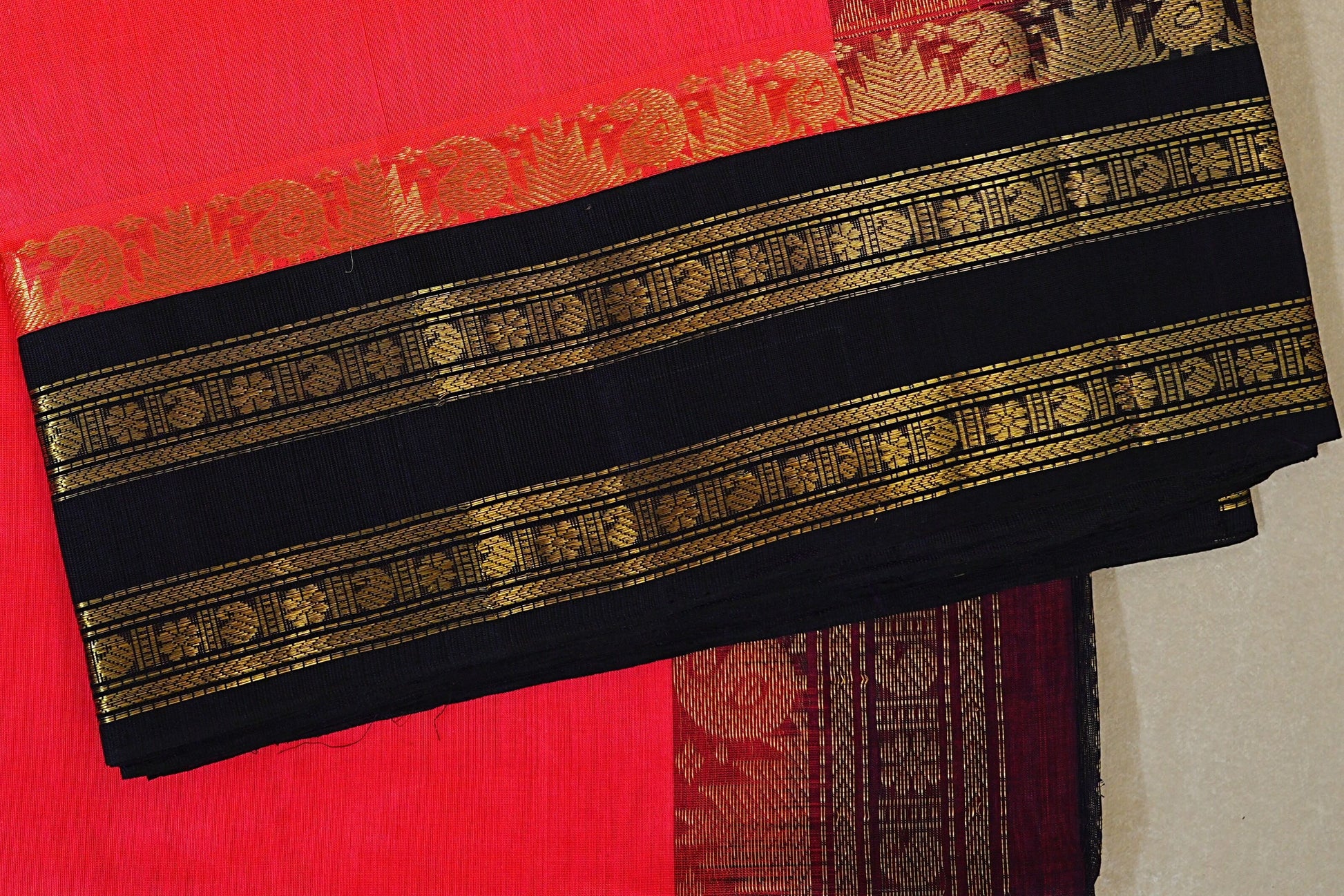 Bright Orangish Pink with Black Borders Silk Cotton Saree border zoom