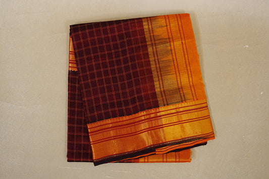 deep maroon silk cotton saree folded 