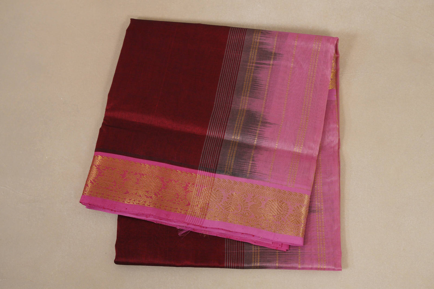 folded Reddish Maroon vegan silk cotton saree
