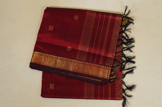 folded Reddish maroon vegan silk cotton saree 