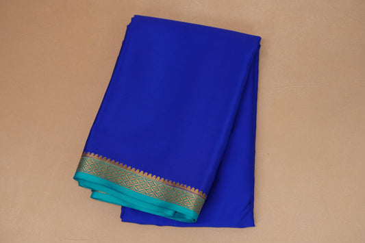 folded Royal Blue with Aqua Blue Borders Mysore Silk Saree