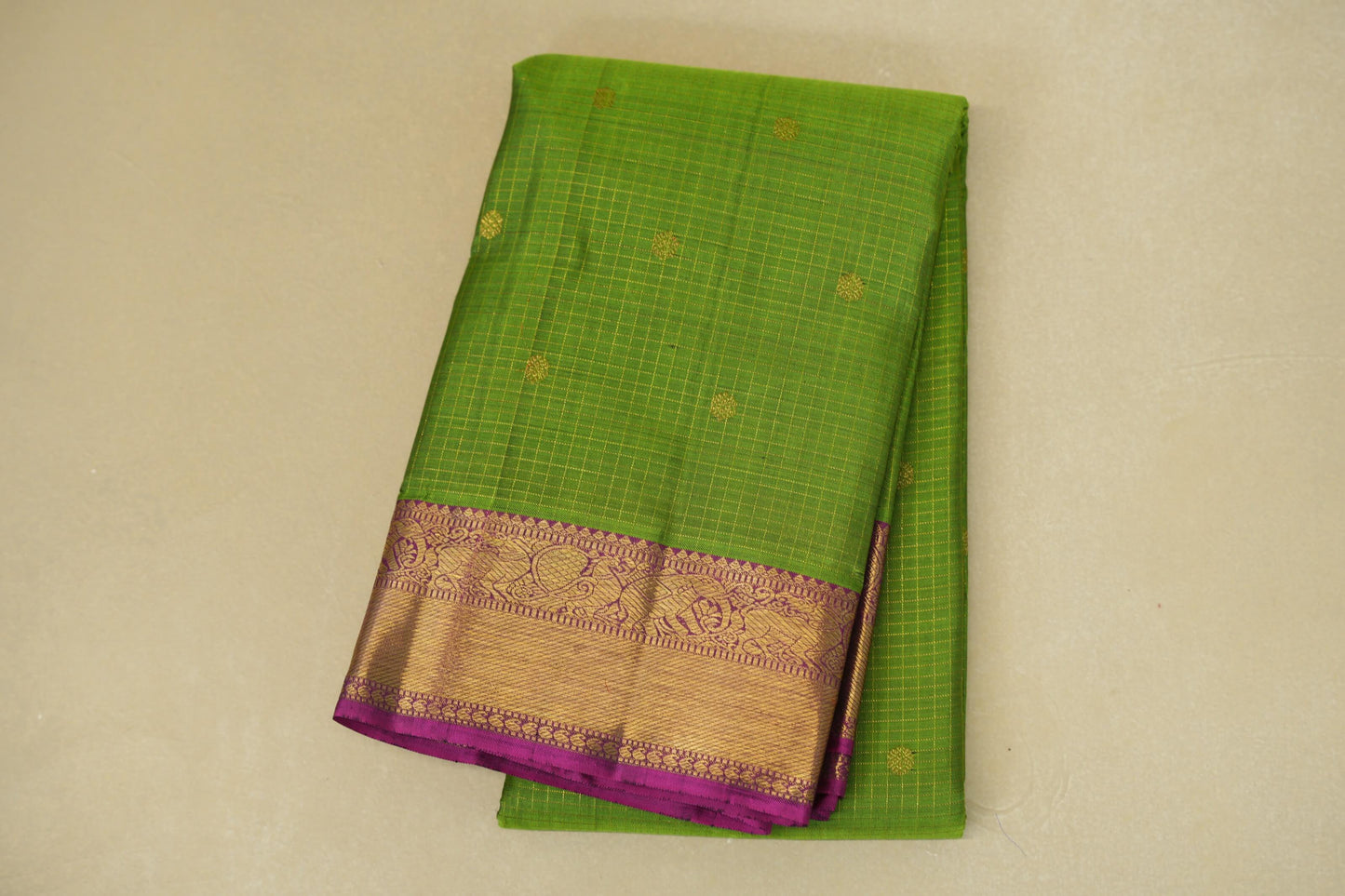 folded Parrot Green zari checks Heirloom Kanjivaram Silk Saree