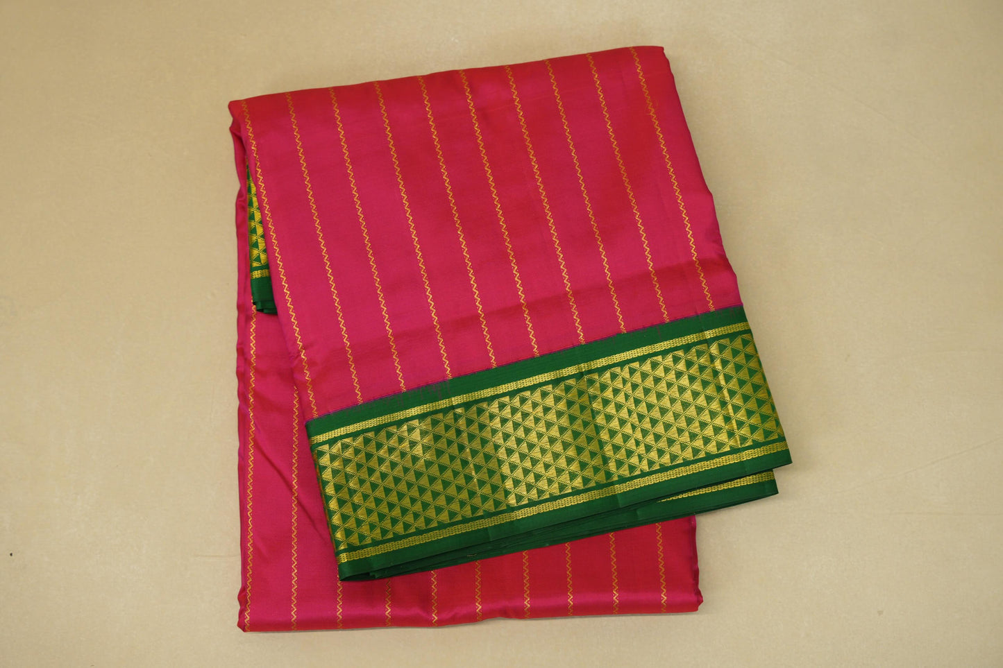 folded Rani Pink Ten yards silk saree 