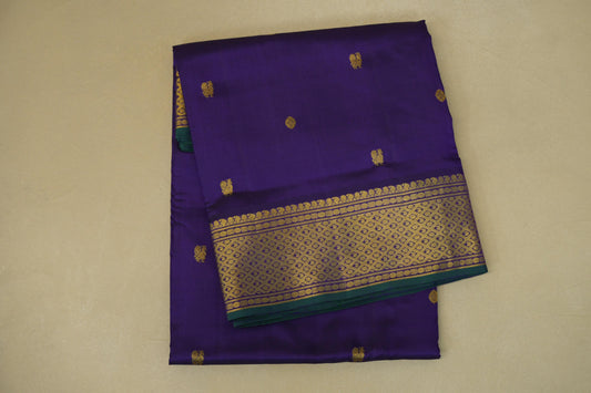 folded Royal Purple with Green Selvedge Borders Ten yards silk Saree  