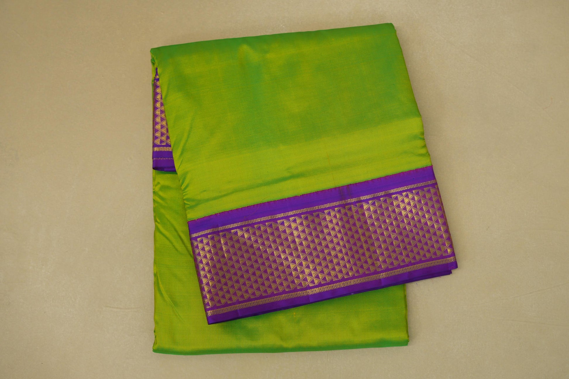 folded Bright Parrot Green with Purple Borders Ten Yards Silk Saree