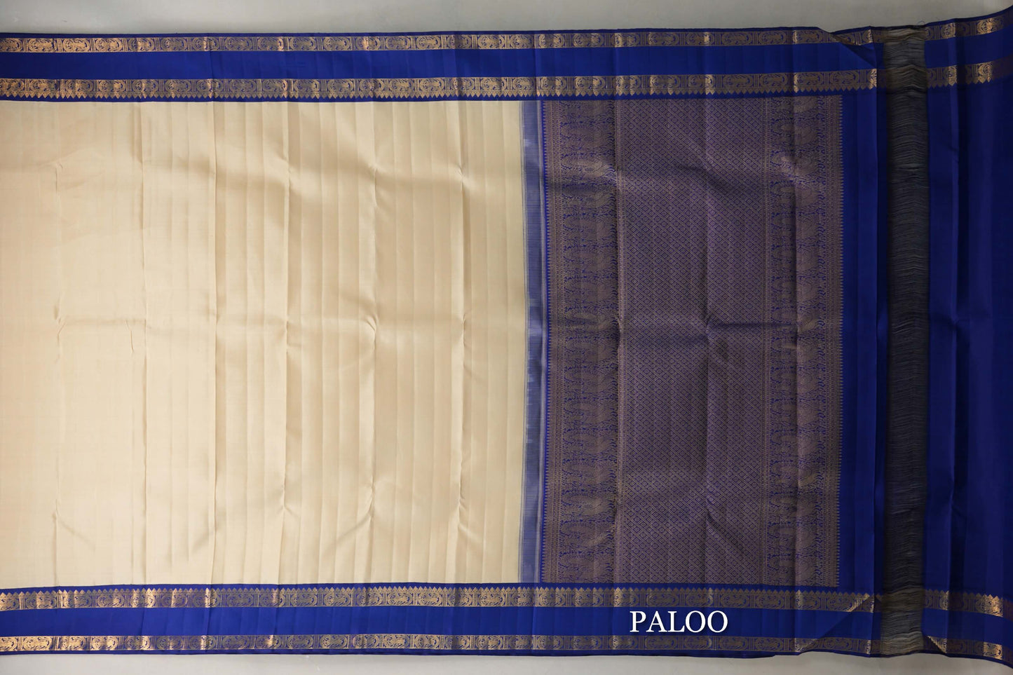 Cream Beige with Deep Royal Blue Rettai Pettu Borders Plant Based Kanjivaram Silk Saree paloo