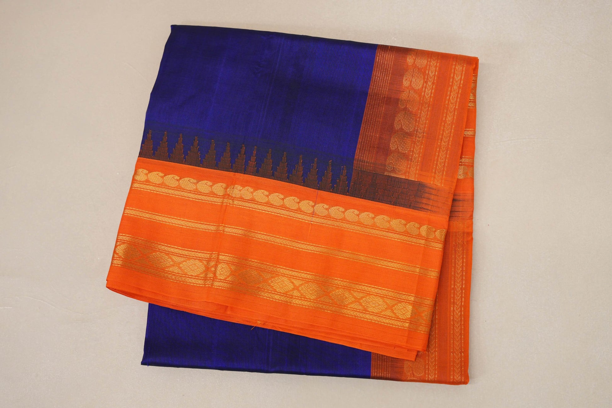 folded Royal Blue with Bright Orange Borders Silk Cotton Saree